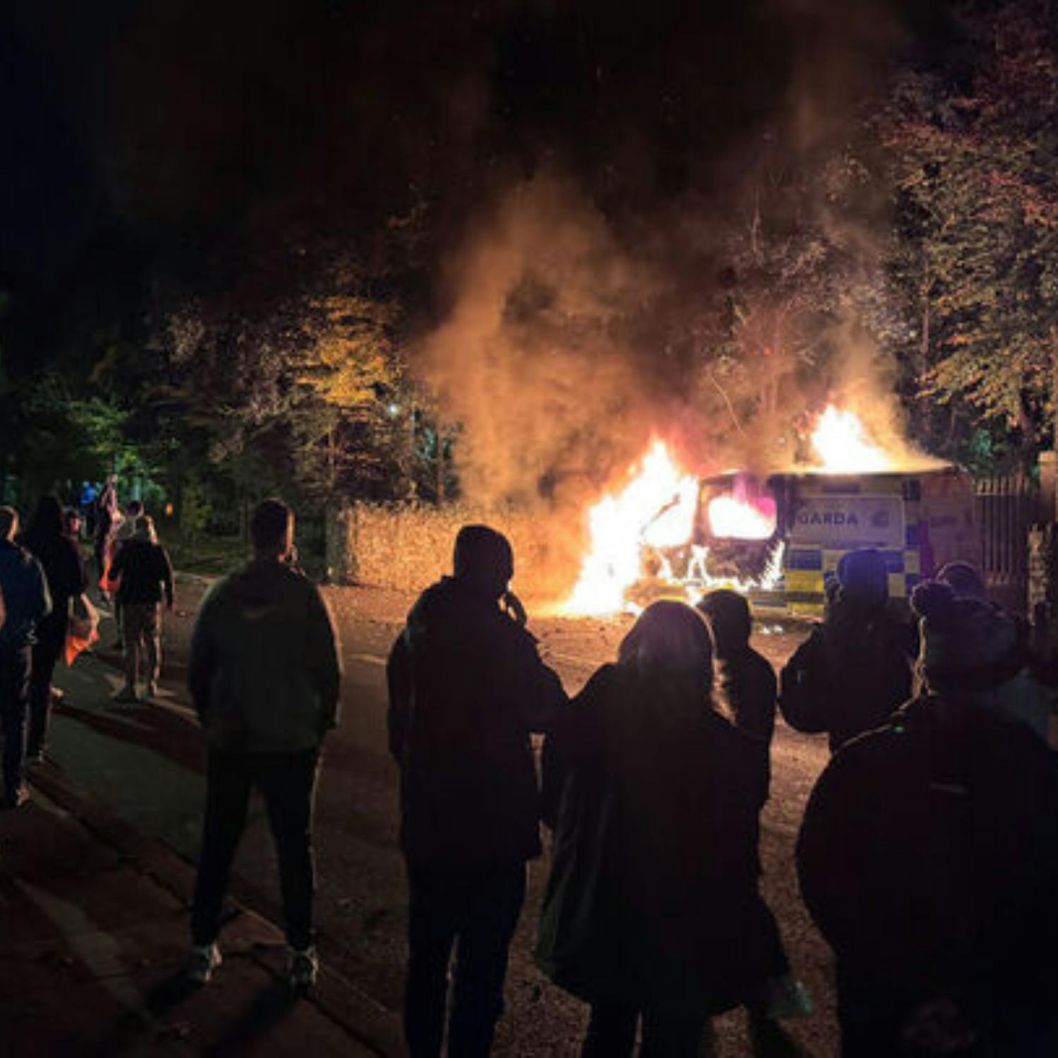 Garda van burned and fireworks launched at police at Citywest Hotel Garda van burned and fireworks launched at police at Citywest Hotel