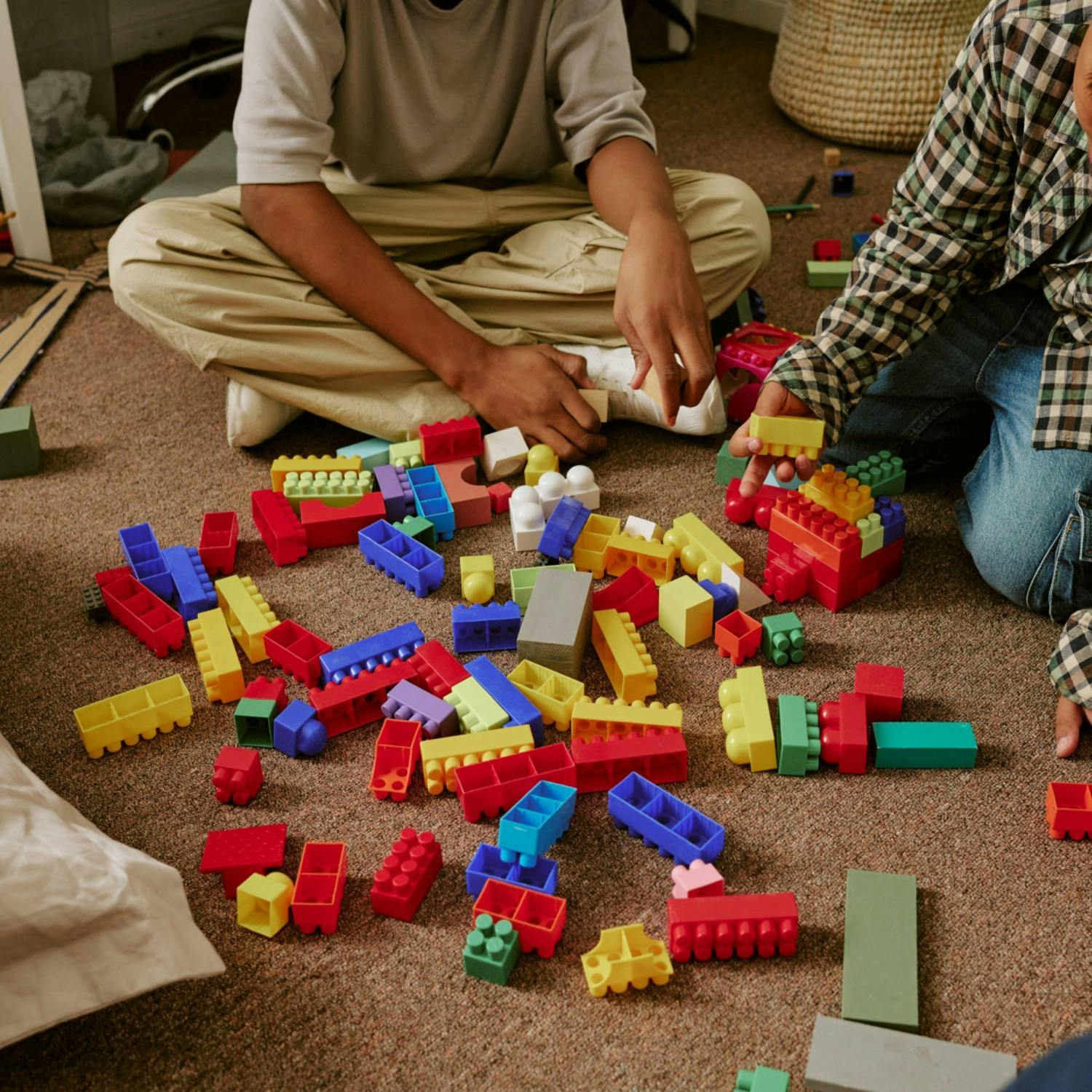Adults playing with toys