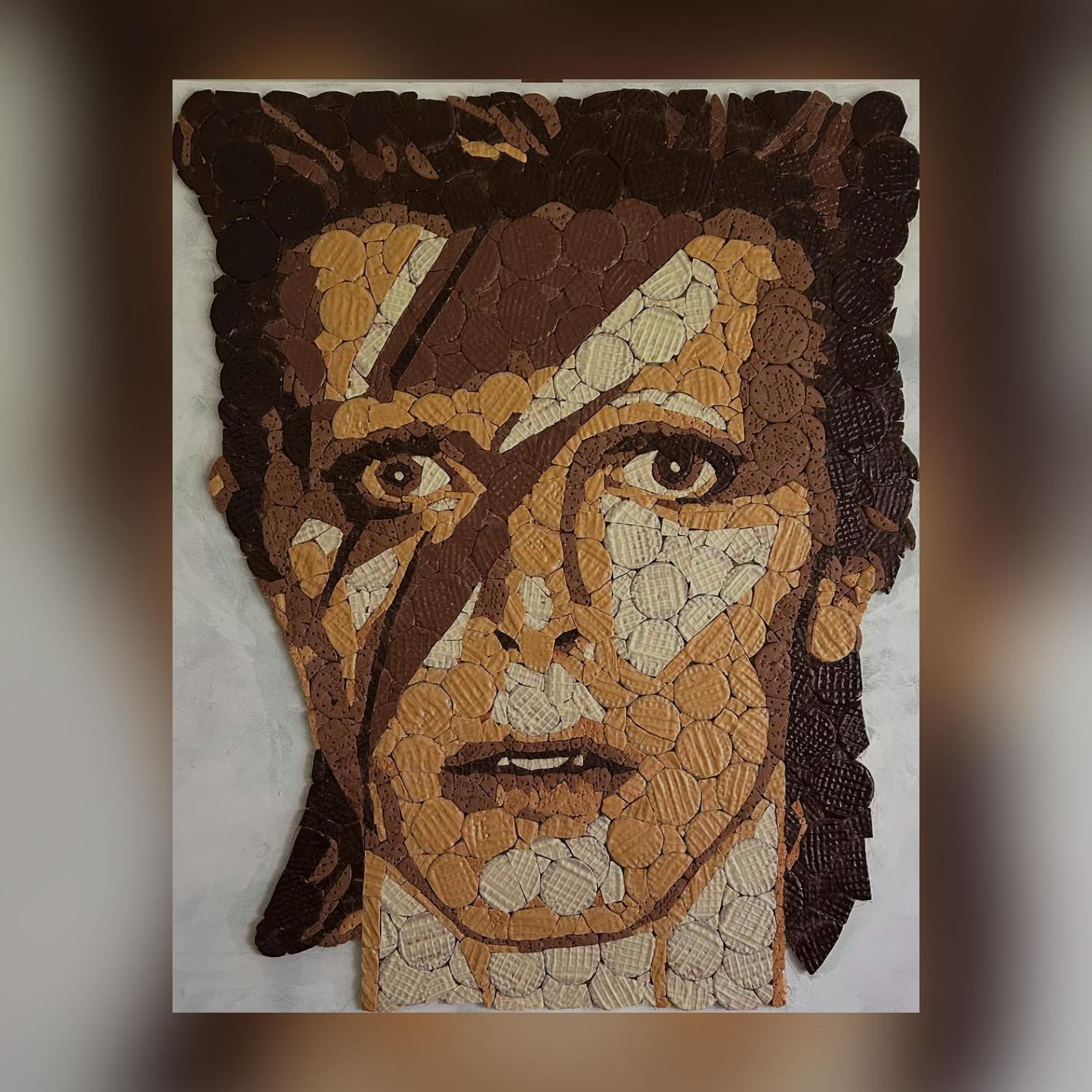 Making a mosaic out of digestive biscuits! Image